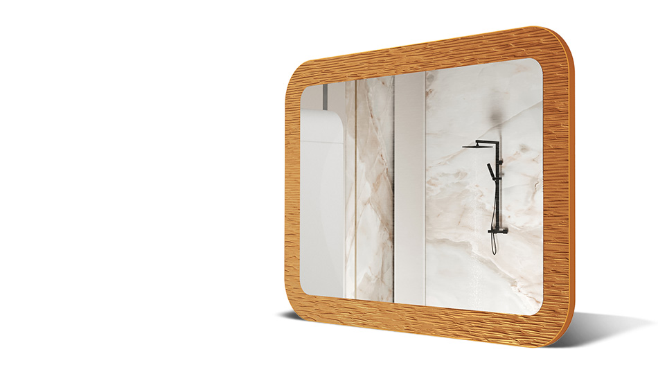 Speil i ramme med metalldekor. Symbol på moderne eleganse